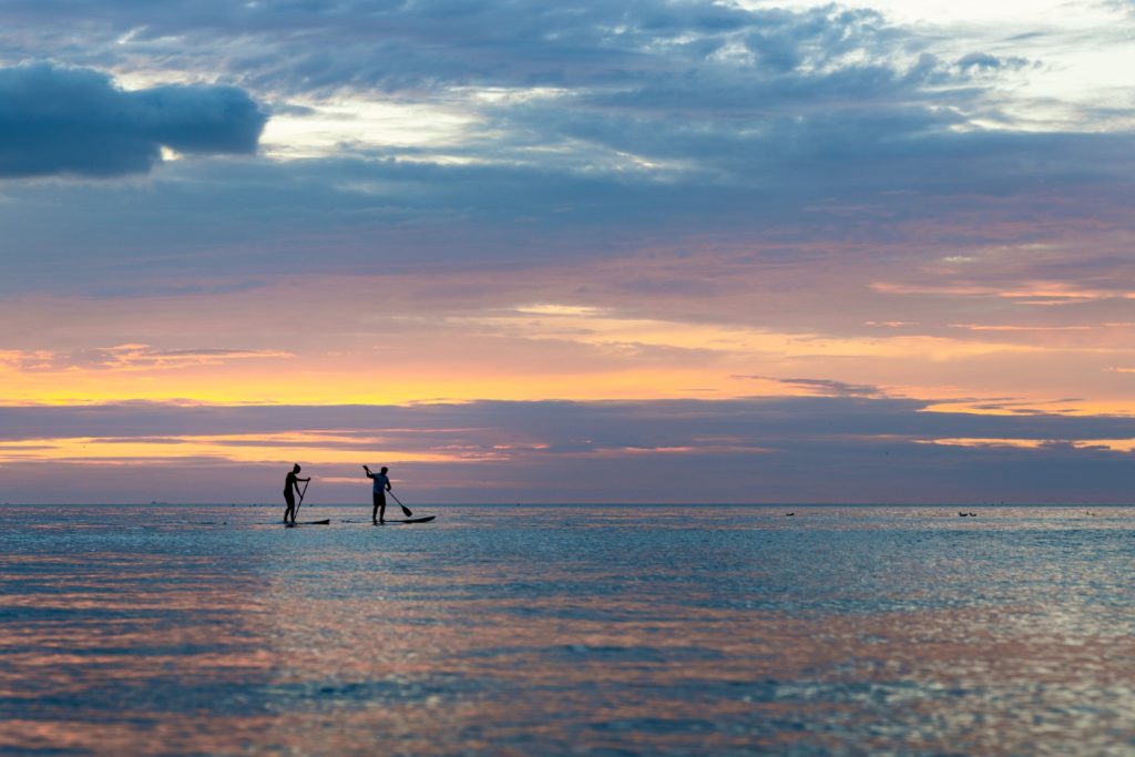 kayaking ocean sunset